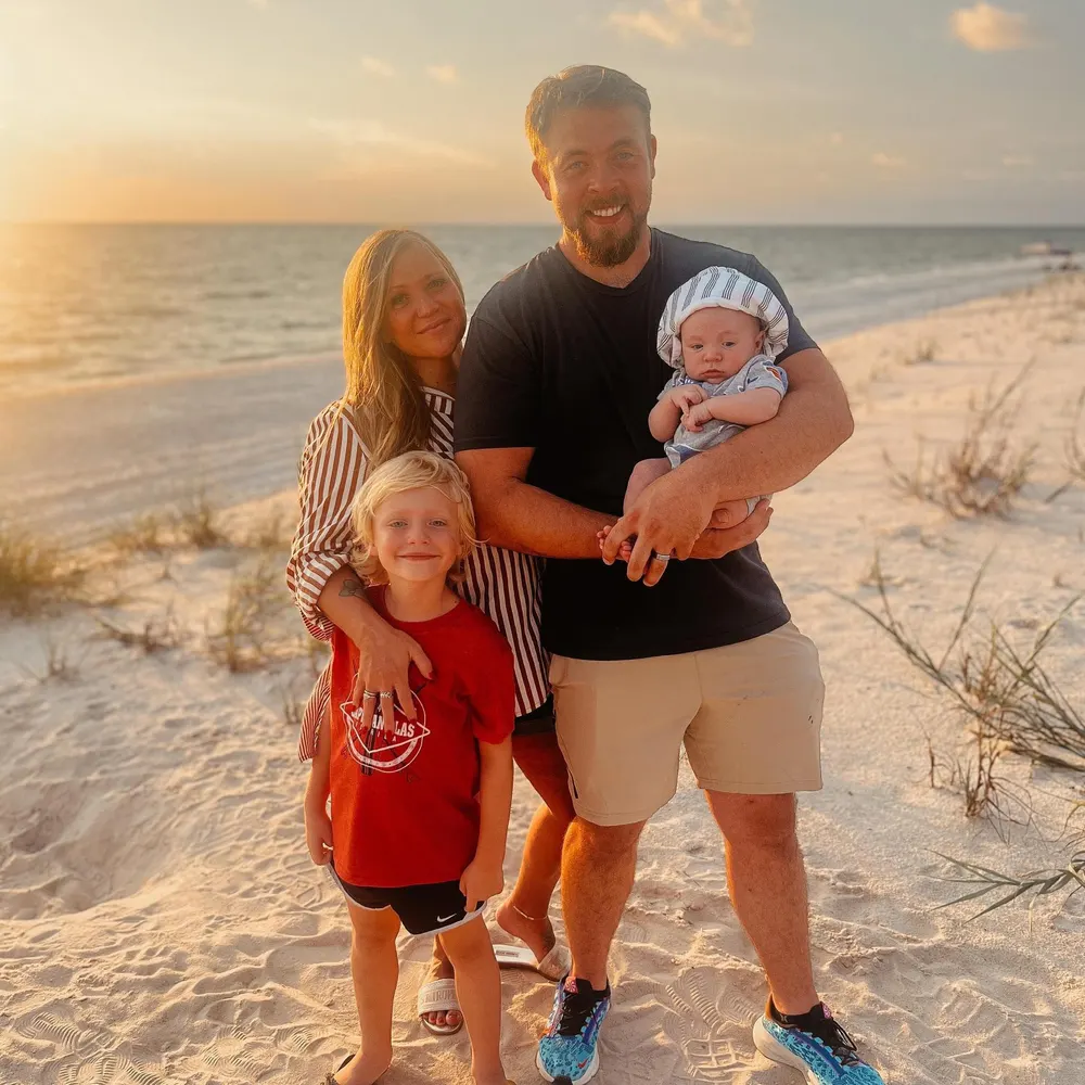 Owner Aaron Roland with his family