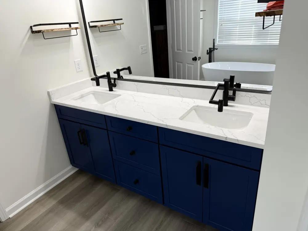 Double vanity with matte black faucets